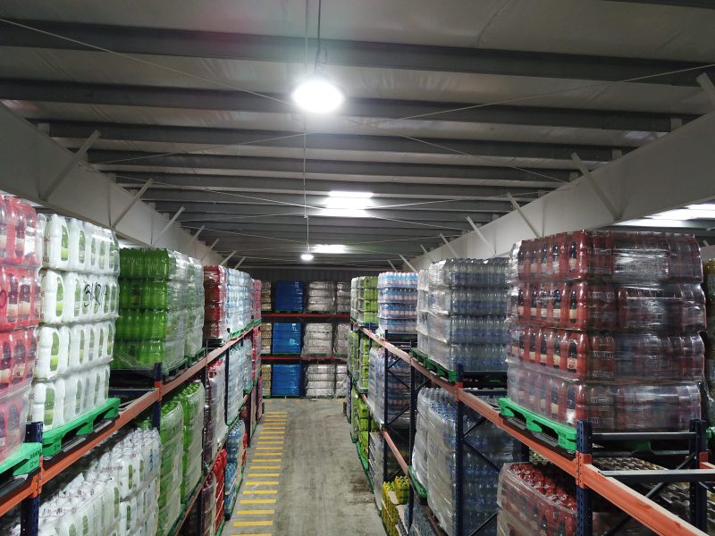 Inside the brewery storage in Punta Arenas, Chile with metal building insulation and storage racks